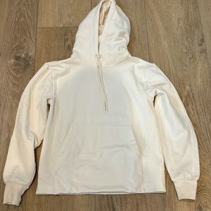 Athleta hooded sweat shirt ivory color. No tags but never worn. Very soft.